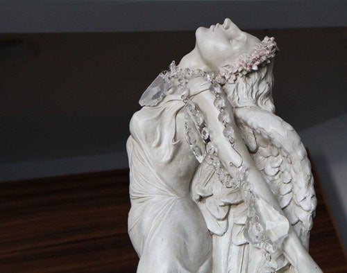 <strong>Goddesses guard Joan’s space.</strong>