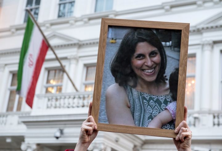 Supporters hold a photo of Nazanin Zaghari-Ratcliffe during a vigil for the British-Iranian wonan imprisoned in Tehran outside the Iranian Embassy in January.