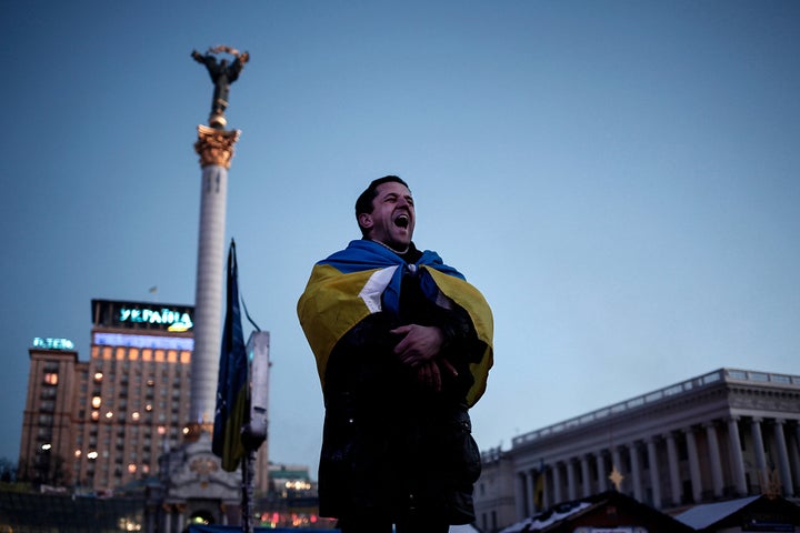 An anti-government protester shout slogans at Kiev's Maidan square on Feb. 4, 2014.