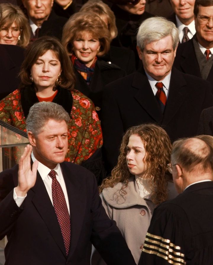 President Bill Clinton is sworn in for his second term by in 1997 as Chelsea looks on