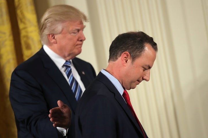 U.S. President Donald Trump congratulates White House Chief of Staff Reince Priebus during a swearing in ceremony for senior