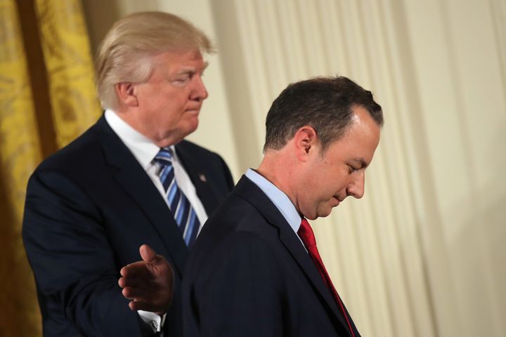 U.S. President Donald Trump congratulates White House Chief of Staff Reince Priebus during a swearing in ceremony for senior staff at the White House in Washington, D.C. January 22, 2017. (REUTERS/Carlos Barria)