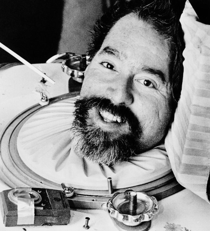 Ed Roberts smiles from his iron lung.