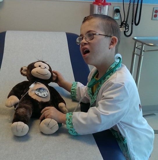 My son, Ben, at the oncology clinic, playing doctor