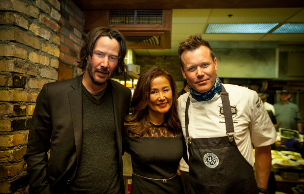 (From left to right) Keanu Reeves, Mimi Kim chat in the kitchen with famed chef Brian Malarkey at ChefDance 2017, sponsored byGiftedTaste, Park City, Utah 