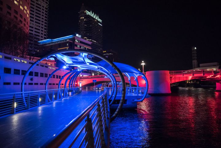 THE RIVERWALK AT NIGHT WITH COLORFUL, CHANGING LIGHTS