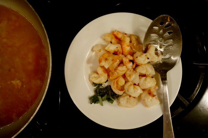 Set the shrimp aside when they are barely cooked (the green on the plate is sage)