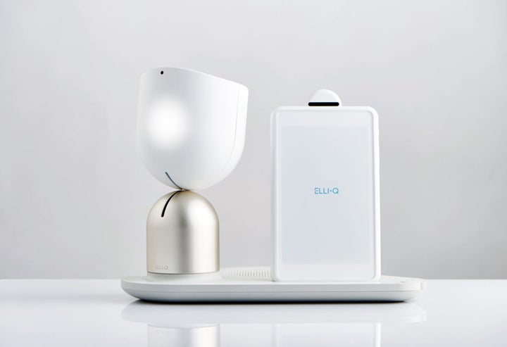Meet ElliQ. She doesn’t have eyes or arms, but she has an hourglass-shaped “body” and a “head” that moves.