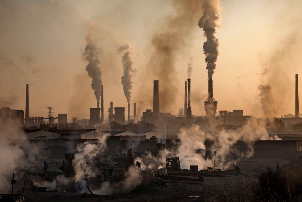 Smoke billows from a large steel plant at an unauthorized factory in Inner Mongolia, China. Nov. 4, 2016.