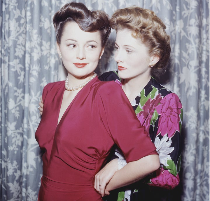 Olivia de Havilland (left) with Joan Fontaine, circa 1945.