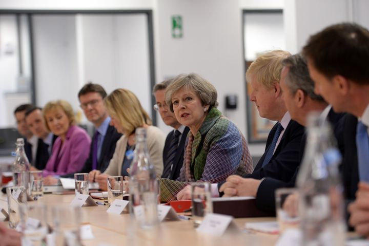 Theresa May (C) holds a regional Cabinet meeting in Runcorn, north west England on January 23.