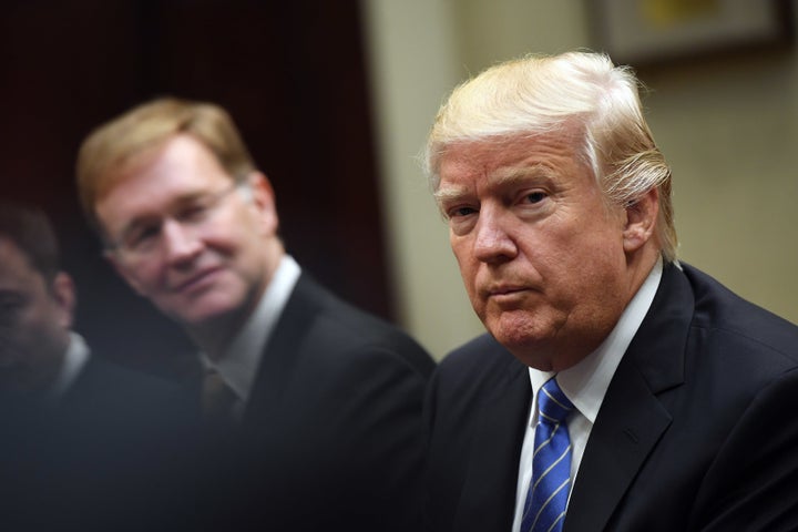 WASHINGTON, DC - JANUARY 23: Wendell P. Weeks of Corning listens to President Donald Trump during a meeting with business leaders in the Roosevelt Room of the White House on Monday January 23, 2017 in Washington, DC.