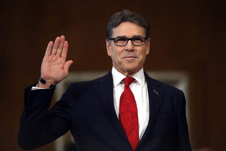 Former Texas Gov. Rick Perry is sworn in before testifying Thursday at a Senate Energy and Natural Resources Committee hearing on his nomination to be energy secretary.