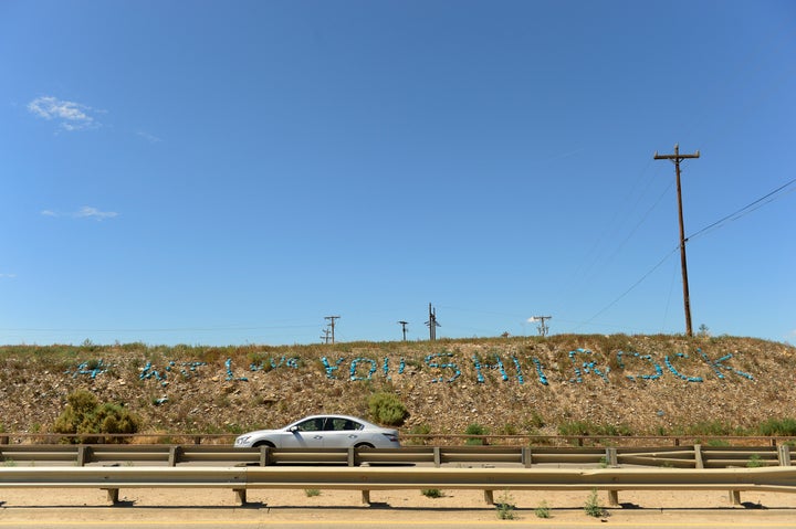 A car drives into Shiprock on Aug. 14, 2015.