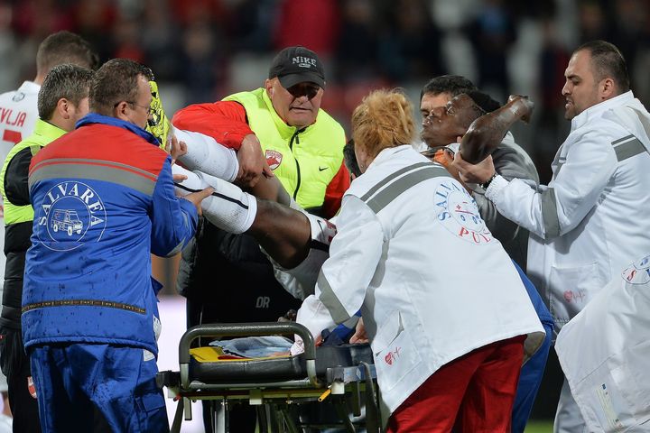 Patrick Ekeng is lifted from the pitch to be transported at hospital after he collapsed during football match between Dinamo Bucharest and Viitorul Constanta in Bucharest on May 6, 2016.