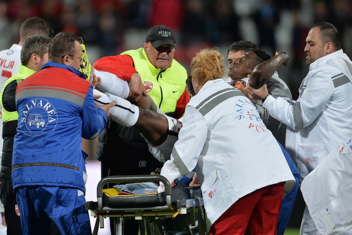 Patrick Ekeng is lifted from the pitch to be transported at hospital after he collapsed during football match between Dinamo