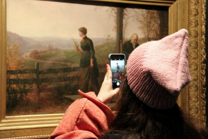 Visitor enjoys free admission at the National Museum of Women in the Arts the weekend of the Women’s March on Washington.