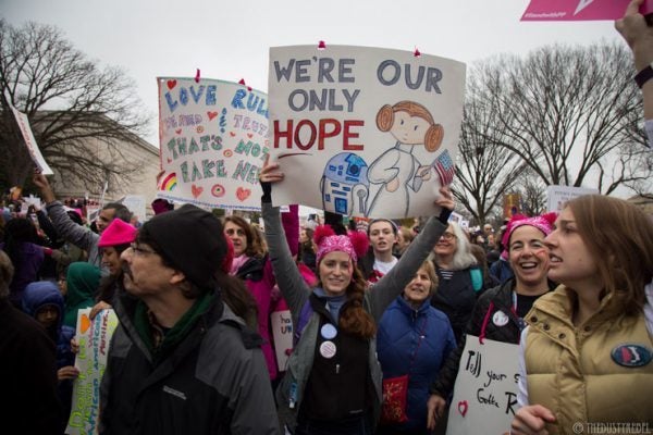 Many signs featured images of Star Wars character Princess Leia as a tribute to the actress who played her and who recently passed away, Carrie Fisher stars as the princess leads The Resistance. 