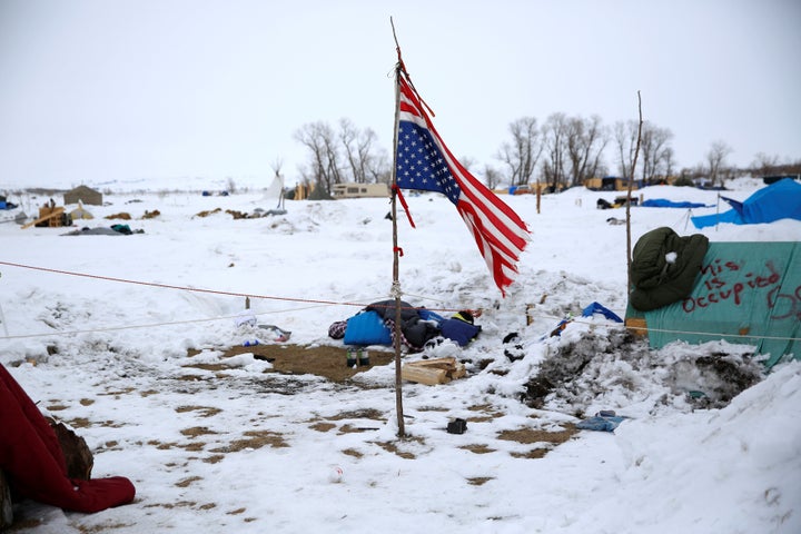 A weathered, inverted America flag catches the wind at the Dakota Access Pipeline protest camp near Cannon Ball, North Dakota, on Jan. 24, 2017.