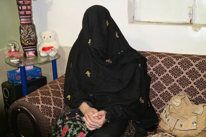 Gulalai, 25, a transgender Afghan living in Pakistan, covers her face to protect her identity.