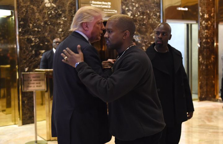 Singer Kanye West and President-elect Donald Trump talk at Trump Tower in December. 