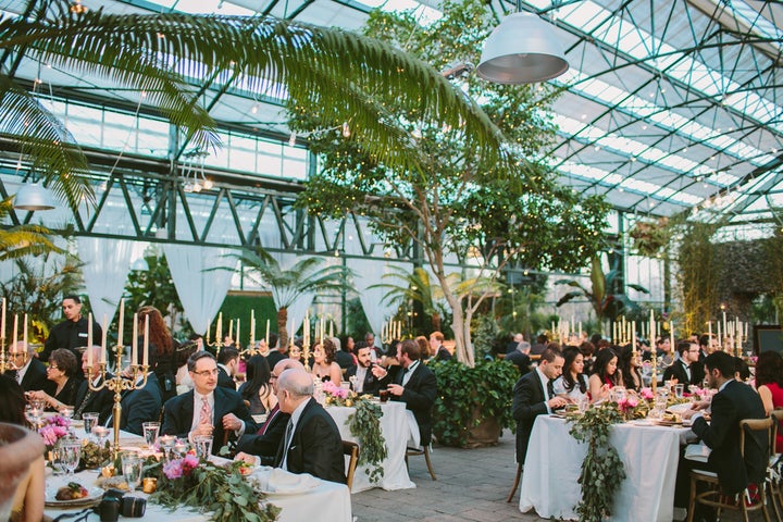 A wedding in the Planterra Conservatory, West Bloomfield, Michigan. Photo Credit: Jill DeVries Photography. 