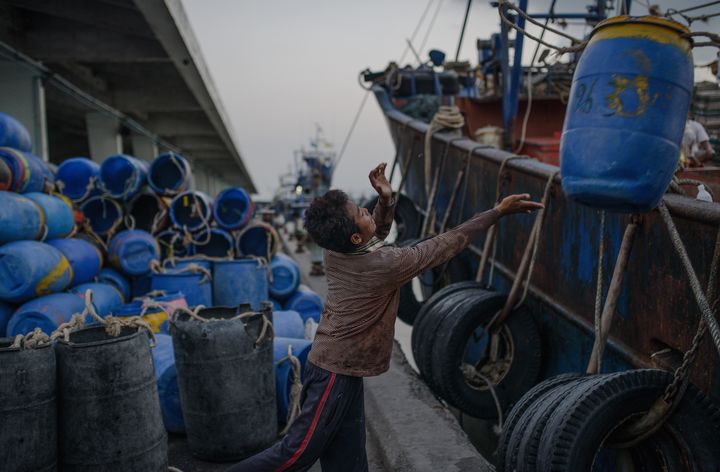 <p>Young Cambodian migrant worker in Thailand’s fishing industry.</p>