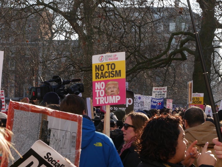 Demonstrators gathered outside the US embassy at Grosvenor Square in London