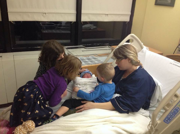 Annabelle (6), Penelope (5) and Isaiah (2) meeting Nate in the hospital.