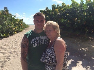 <p>Laurie with her son Brandon in 2015.</p>