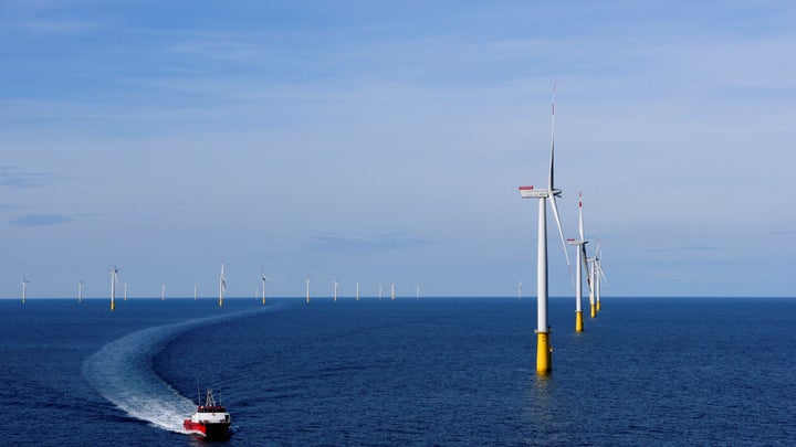 A boat sails past DanTysk wind farm in Esbjerg, Denmark. 