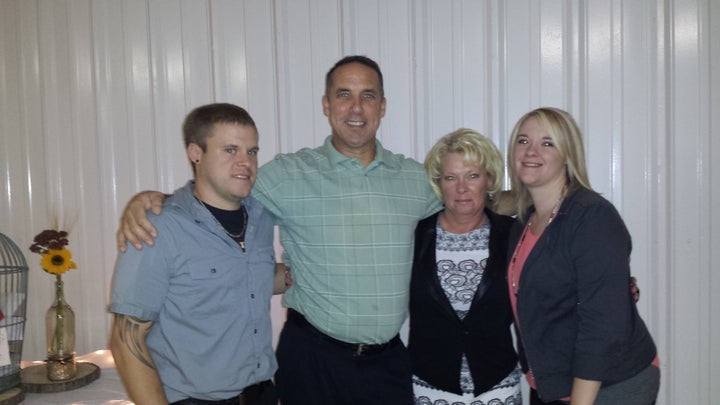 <p>Brandon with his family in happier times.</p>