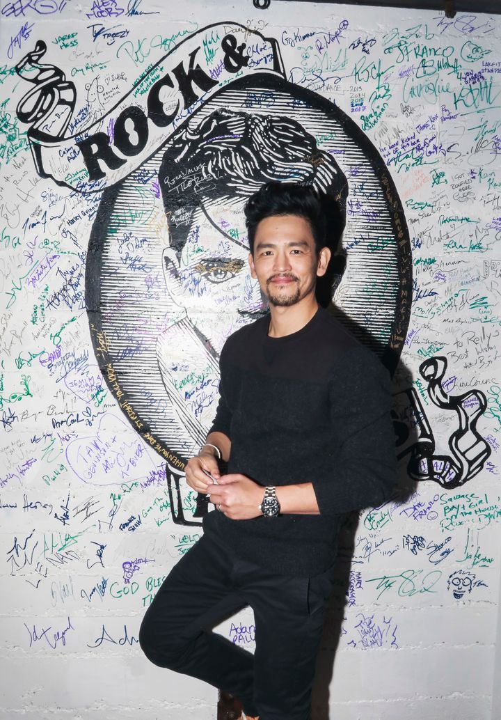<p>John Cho signing the wall at Rock & Reilly’s during the 2017 Sundance Film Festival.</p>