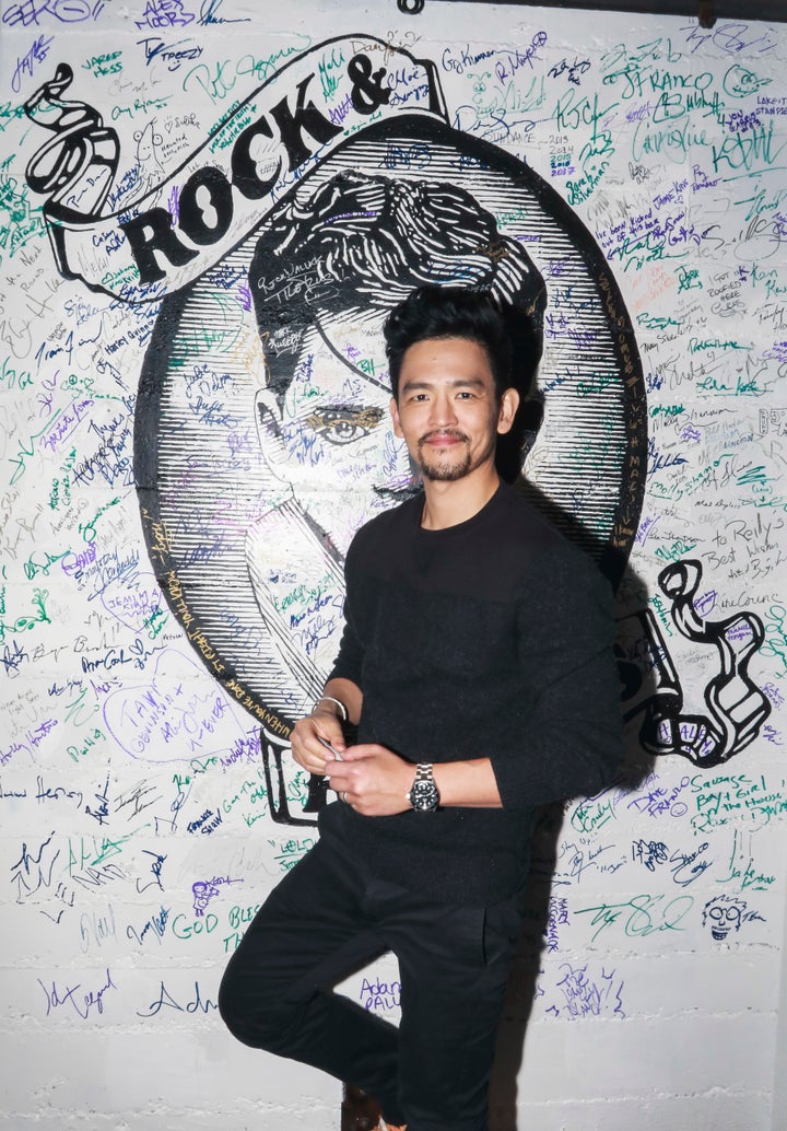 John Cho signing the wall at Rock & Reilly’s during the 2017 Sundance Film Festival.