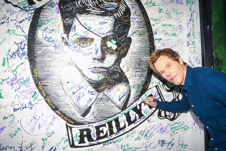 <p>Kevin Bacon signing the wall at Rock & Reilly’s during the 2017 Sundance Film Festival.</p>