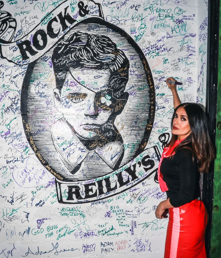 <p>Salma Hayek signing the wall at Rock & Reilly’s during the 2017 Sundance Film Festival.</p>