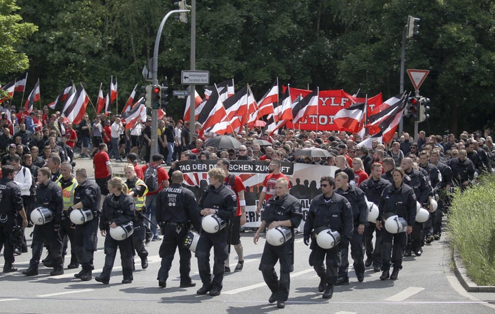 Neo-Nazi demonstrators march through the streets of Dortmund, Germany