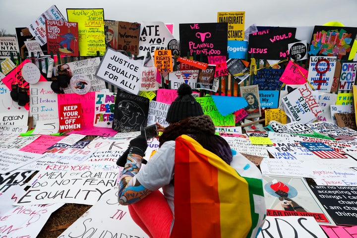 A wall of signs outside the White House for the Women's March on Washington. Jan. 21, 2017.