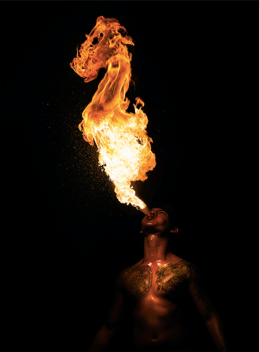 Location: Singapore Night Safari.“He is part of a troupe of firebreathers who deliver a breathtaking performance. For twenty minutes I stood mesmerised by their display, shooting off photo after photo. I’ve never seen such an athletic, intense fire show! Because the action is so fast and furious it can be a little hit-and-miss as to whether you get a good shot and there was no time to check my results - I didn’t want to miss a moment.