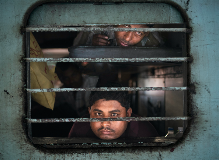 Location: Jaipur, Rajasthan, India. "I am fascinated by people in their own environment during their daily life. The train station is a key moment for many people and the second class is where one can better appreciate the adaptive nature of these people. I ask permission before taking any photo and generally people are very generous, curious and helpful." 