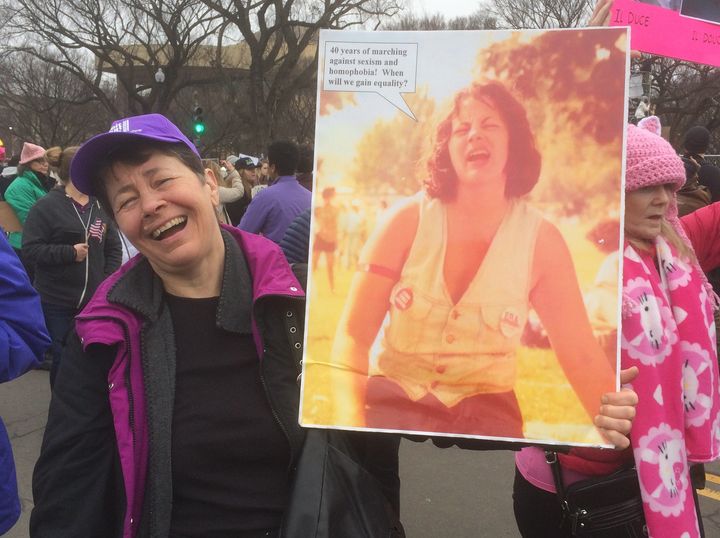 Fran DeBenedictis protested President Donald Trump in D.C. by carrying a sign with a picture of herself on it -- from a women's march 40 years earlier in D.C. Meta!
