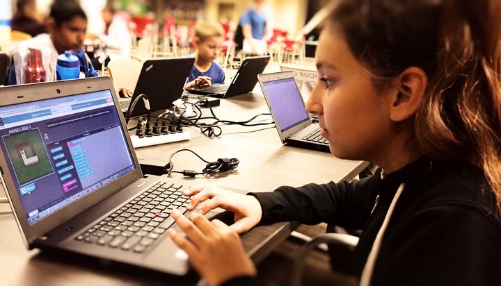 Middle school students practicing writing code at the flagship TGR Learning Lab in Anaheim, CA. 