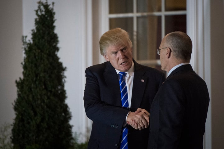 Donald Trump, then president-elect, and Andy Puzder walk out the clubhouse at Trump National Golf Club Bedminster in Bedminster Township, N.J., on Nov. 19.