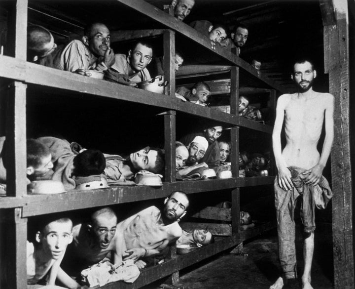 Victims of the Buchenwald concentration camp, liberated by the American troops of the 80th Division. Among them is Elie Wiesel (seventh from the left on the middle bunk next to the vertical post).