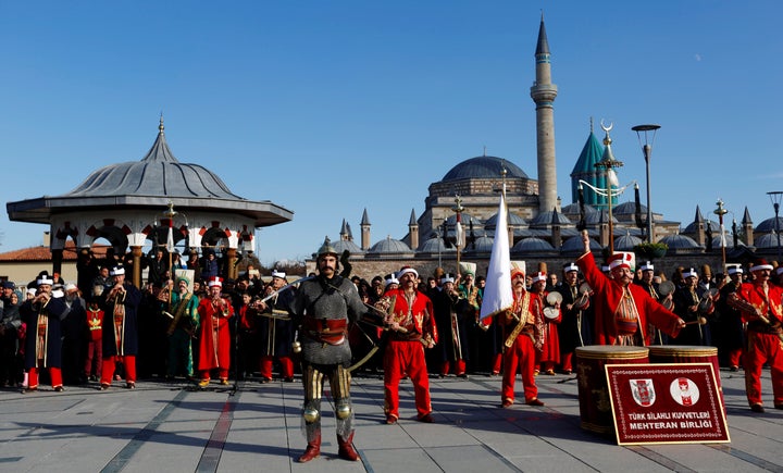 Turkish soldiers, members of the historical Ottoman military band of Mehter, perform outside the Mevlana museum during a ceremony, one of many marking the 743rd anniversary of the death of Mevlana Jalaluddin Rumi, in Konya, Turkey, December 7, 2016.