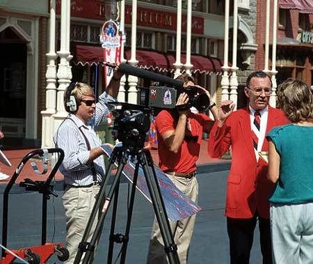 <p>Charlie Ridgway works with Disney World’s own video team at the 15th anniversary celebration of the opening of the Magic Kingdom theme park.</p>