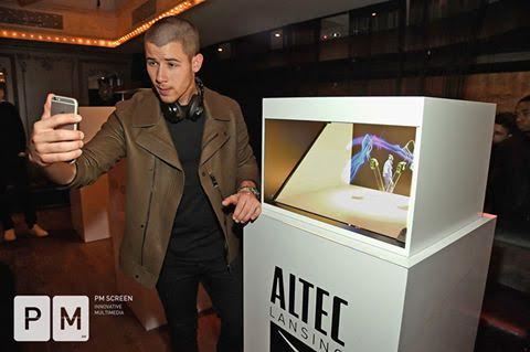 Nick Jonas near PM Screen hologram