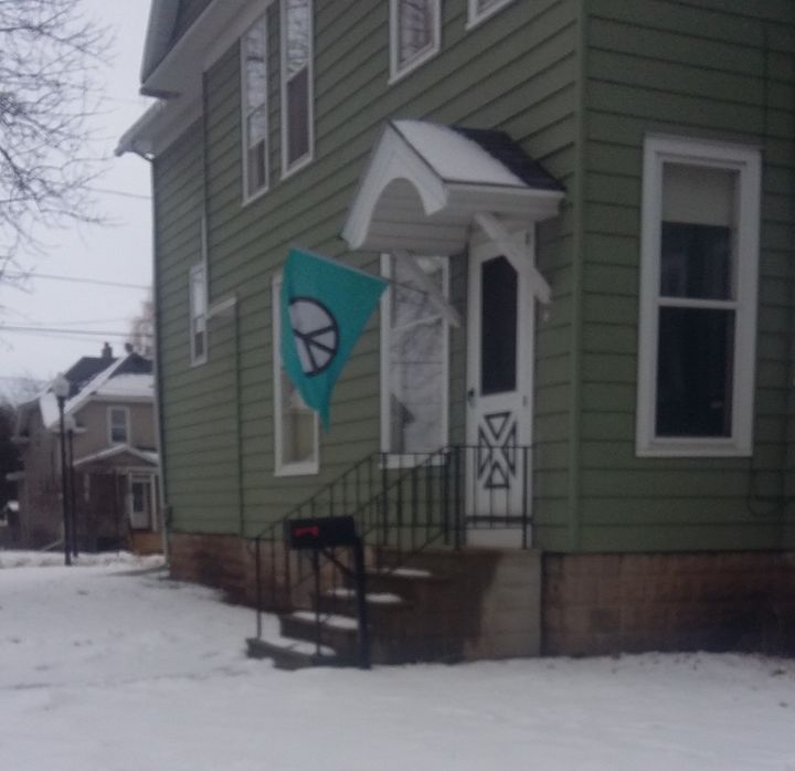 Someone put a peace flag in front of the house on Wednesday.