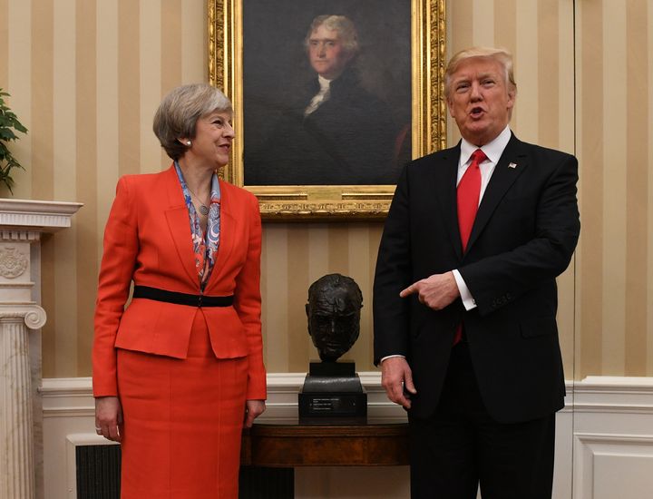 Prime Minister Theresa May meeting US President Donald Trump by a bust of Sir Winston Churchill in the Oval Office of the White House, Washington DC, USA.