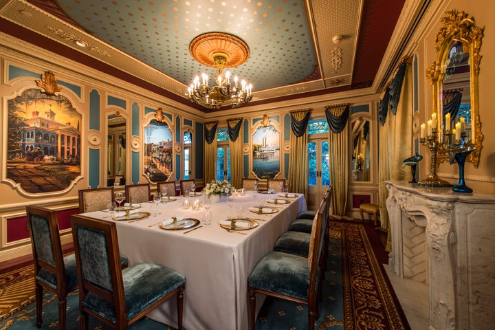 Dining room decor is based on Walt Disney's original plans for a private hangout in the park.